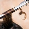Curling with tongs hair